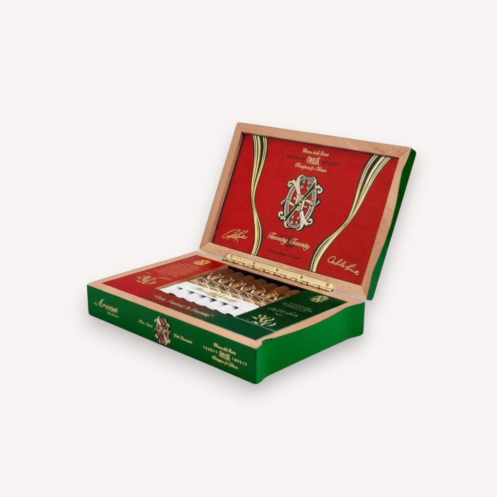 Arcadia Cigars Arturo Fuente Opus X 2020 Arena D'Amor Toro cigars in a green and red collectible box.