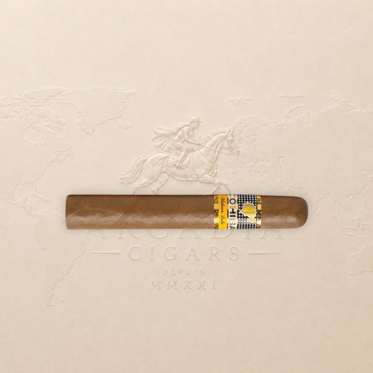 Arcadia Cigars Cohiba Siglo VI cigar with a golden band and brown wrapper. Medium to full strength.