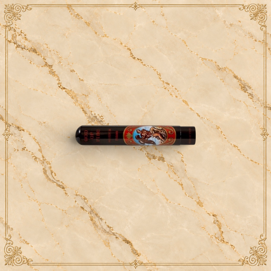 Arcadia Cigars God of Fire Serie B Robusto cigar in a protective black tubo with ornate decorative branding