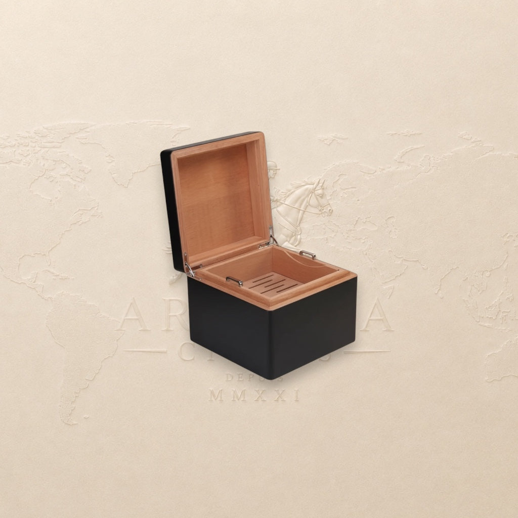 Arcadia Cigars S.T. Dupont black lacquered wood cigar humidor with palladium details, holds 50-75 cigars.