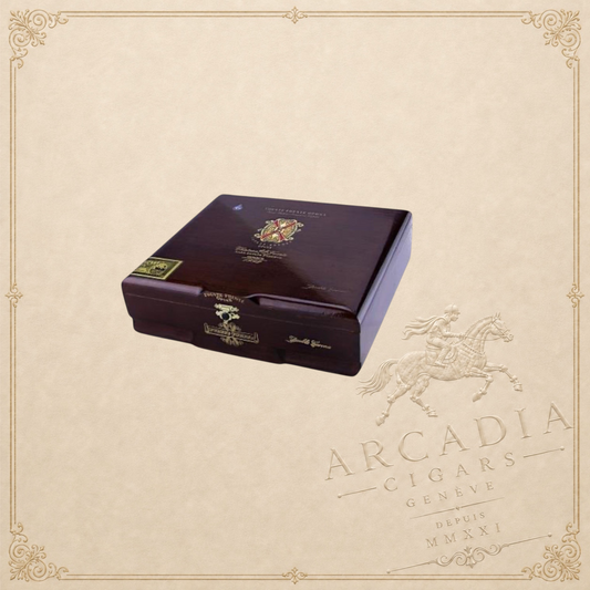 Arcadia Cigars Arturo Fuente Opus X Double Corona wooden cigar box with gold branding on a light beige background.