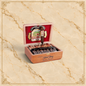 Arcadia Cigars Arturo Fuente Hemingway Short Story cigar standing upright in its open wooden box with branding.