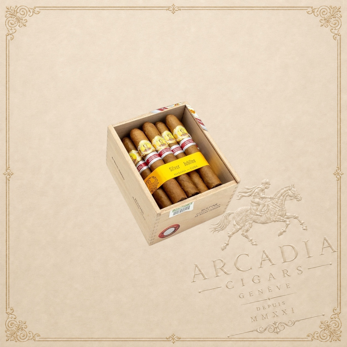 Arcadia Cigars box of Bolivar Silver Jubilee Petit Corona cigars with yellow band and Cuban tobacco leaves