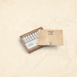Arcadia Cigars Davidoff Signature Tubos 2000 cigars in an open wooden box on a textured beige background