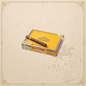 Arcadia Cigars Partagas Churchills De Luxe cigar resting on its yellow wooden box against a neutral background.