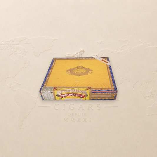 Arcadia Cigars Partagás Lonsdales cigar box with yellow label and traditional Cuban branding on a neutral background