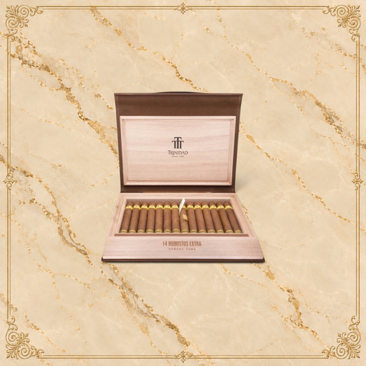 Arcadia Cigars Trinidad Robustos Extra cigars in a wooden travel humidor with gold branding on a beige background