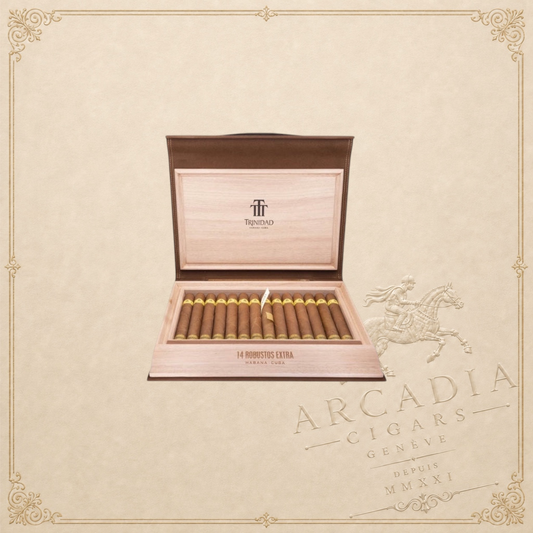 Arcadia Cigars Trinidad Robustos Extra cigars in a wooden travel humidor with gold branding on a beige background