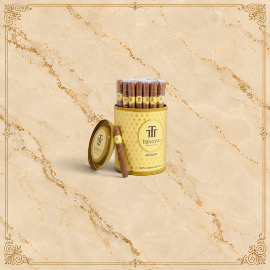 Arcadia Cigars Trinidad Short 40 cigarillos in a gold tin with one cigar placed in front on a beige background.