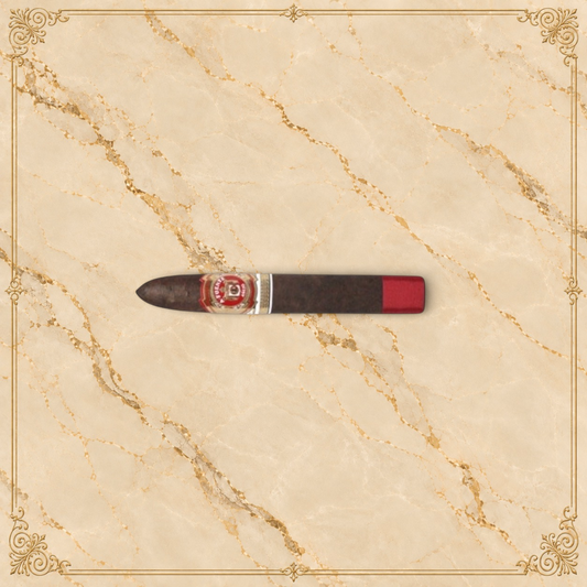 Arcadia Cigars Arturo Fuente Añejo No. 77 Shark cigar with a dark Connecticut Broadleaf Maduro wrapper and red band.