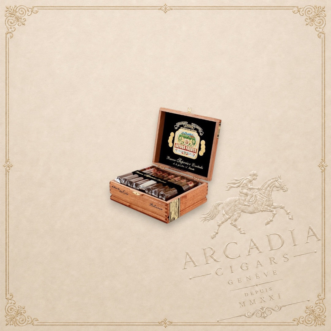 Arcadia Cigars Arturo Fuente Don Carlos Belicoso cigars in an open wooden box with a decorative interior lid label.