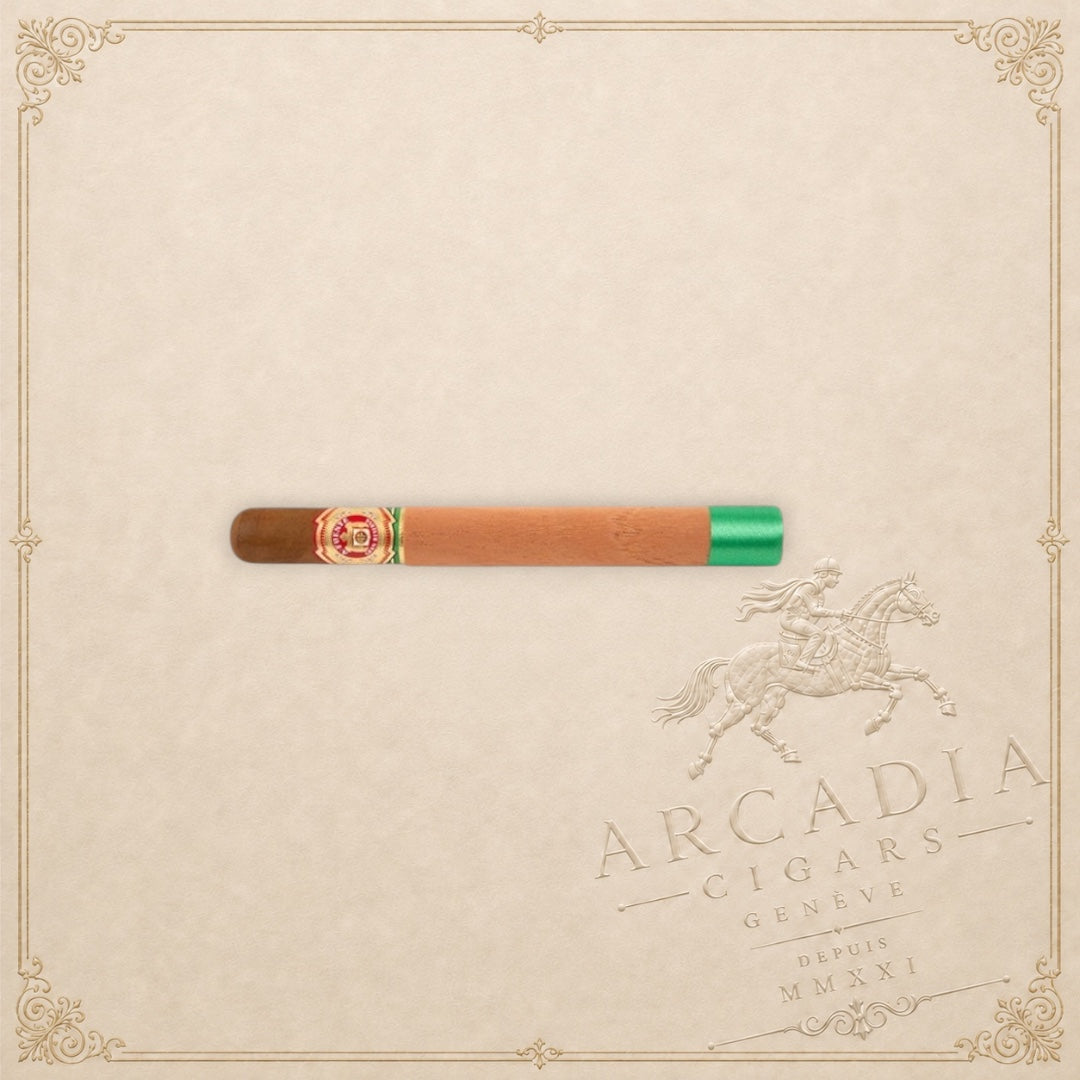 Arcadia Cigars Arturo Fuente Double Chateau cigar with a cedar sleeve and green ribbon on a cream background