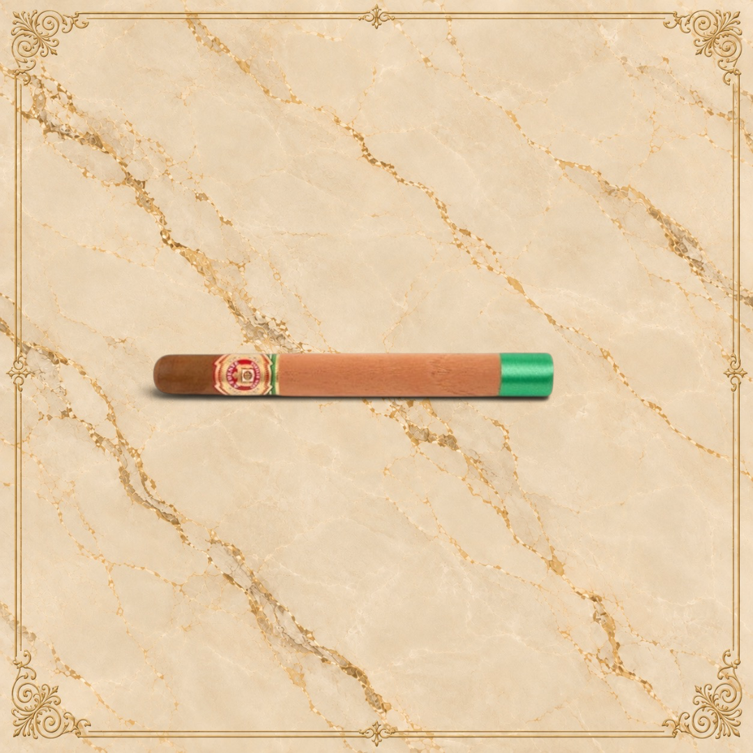 Arcadia Cigars Arturo Fuente Double Chateau cigar with a cedar sleeve and green ribbon on a cream background