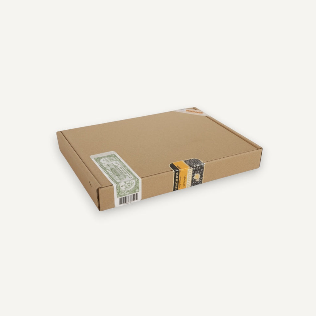 Arcadia Cigars Cohiba Piramides Extra box, featuring a cardboard exterior with green and gold band details.