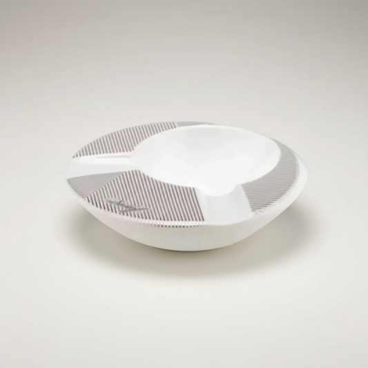 Arcadia Cigars white porcelain round ashtray with grey pinstripe detail and two cigar rests.