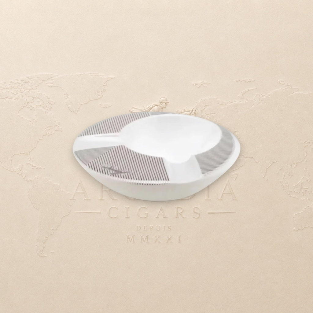 Arcadia Cigars white porcelain round ashtray with grey pinstripe detail and two cigar rests.
