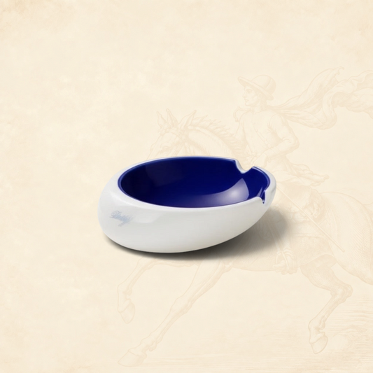 Arcadia Cigars Davidoff Royal Release blue porcelain ashtray with gold insignia and four rests.