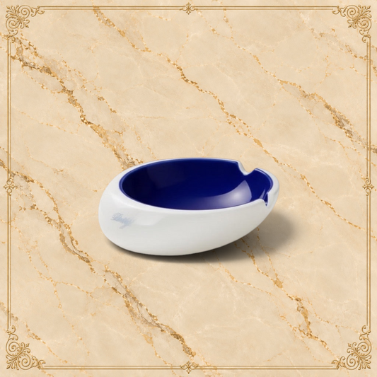 Arcadia Cigars Davidoff Royal Release blue porcelain ashtray with gold insignia and four rests.