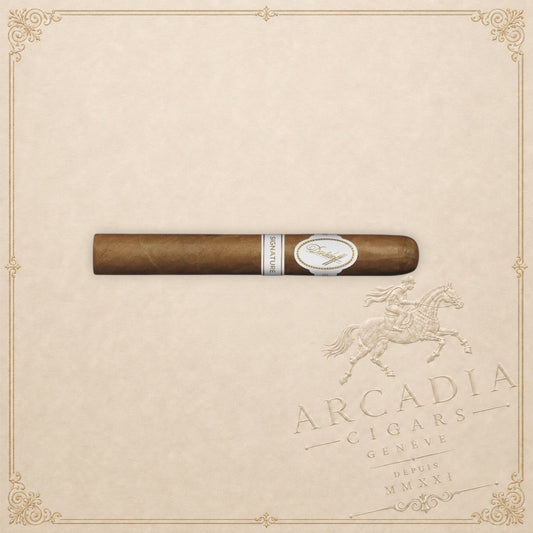 Arcadia Cigars Davidoff Signature Vintage 2000 corona cigar with white and gold band on a textured cream background.