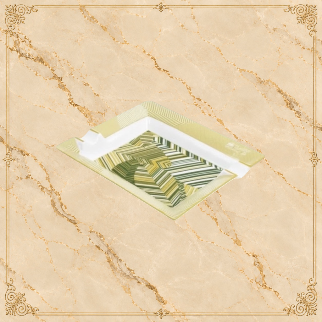 Arcadia Cigars Davidoff Cave de Paille ashtray, golden-beige straw marquetry with green abstract pattern on lacquered base.