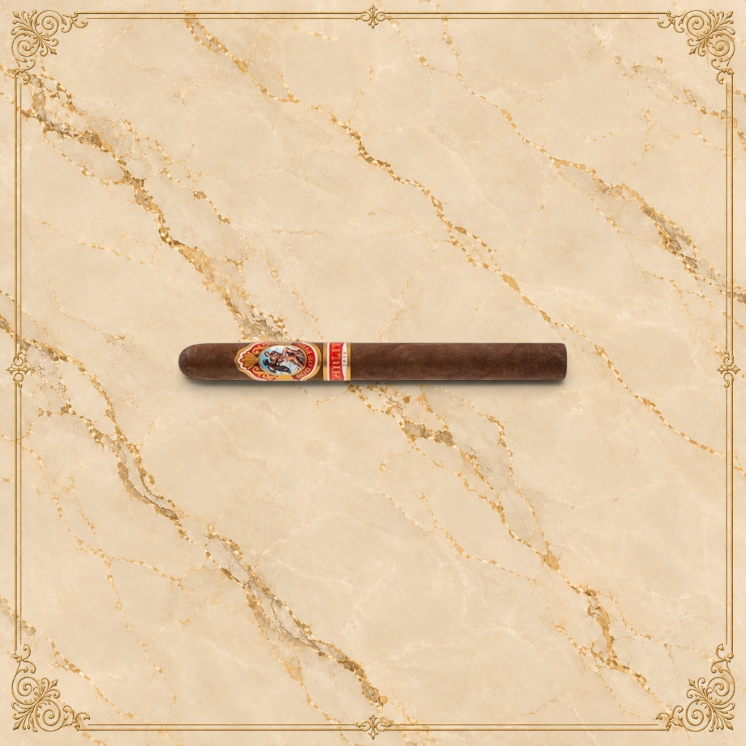Arcadia Cigars God of Fire by Carlito Churchill cigar with a detailed ornate band on a textured cream background