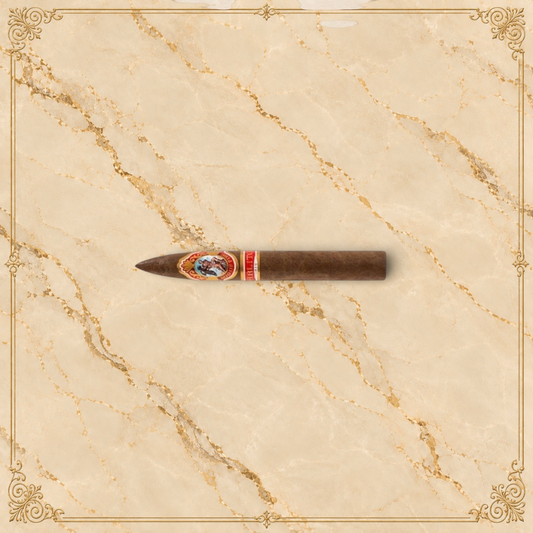 Arcadia Cigars God of Fire by Carlito Piramide cigar with a tapered head and ornate band on a textured background.