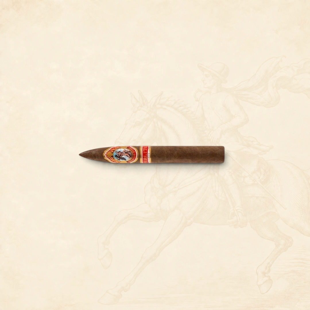 Arcadia Cigars God of Fire by Carlito Piramide cigar with a tapered head and ornate band on a textured background.