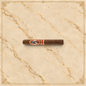 Arcadia Cigars God of Fire by Carlito Double Robusto cigar with detailed band on a cream background