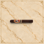 Arcadia Cigars God of Fire Serie B Gran Toro premium cigar with ornate band on a cream background