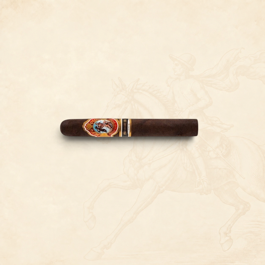 Arcadia Cigars God of Fire Serie B Gran Toro premium cigar with ornate band on a cream background