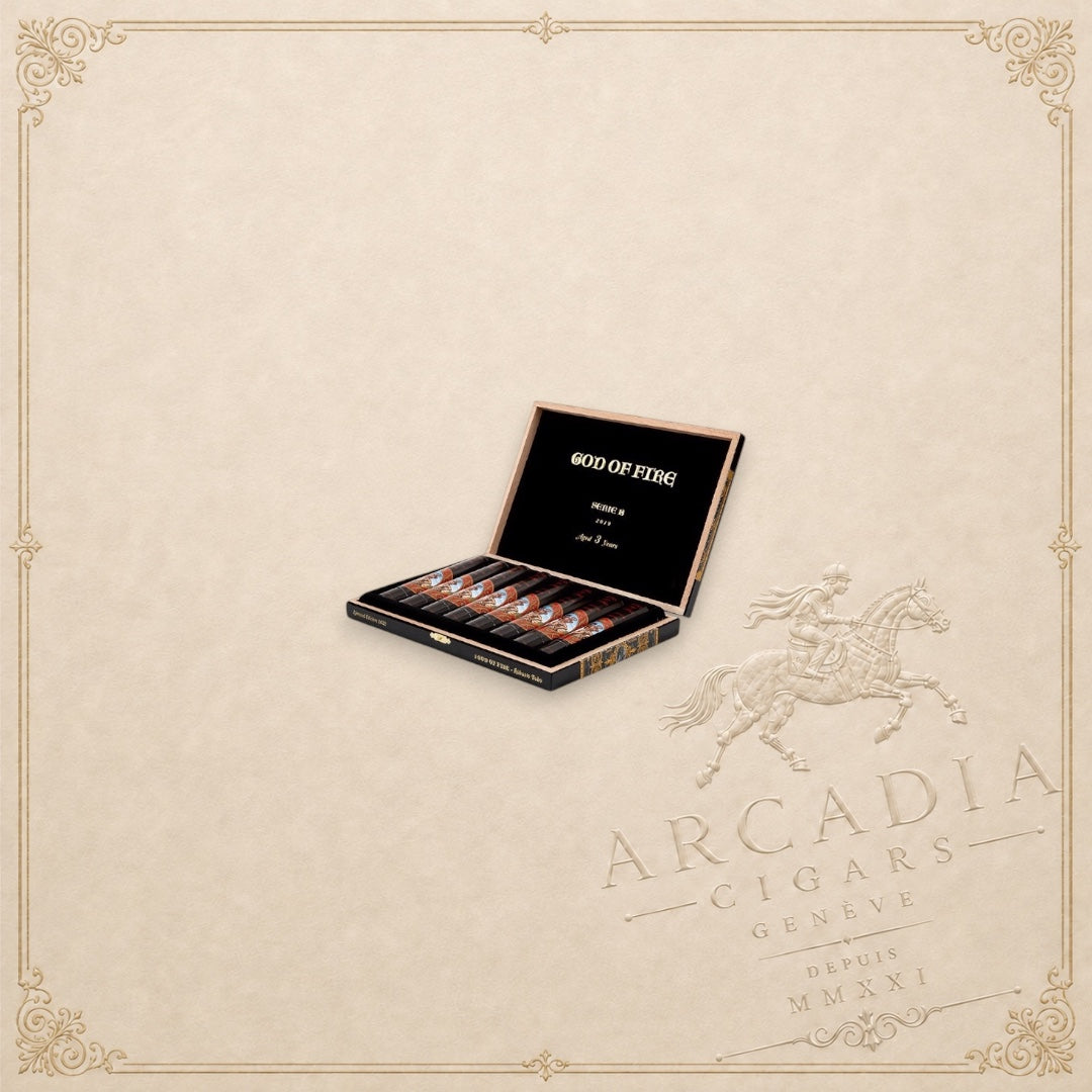 Arcadia Cigars God of Fire Serie B Robusto Tubos cigars in a black presentation box with gold lettering.