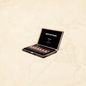 Arcadia Cigars God of Fire Serie B Robusto Tubos cigars in a black presentation box with gold lettering.