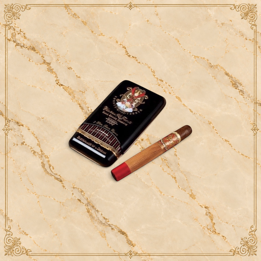 Arcadia Cigars Arturo Fuente Opus X Perfecxion X cigar with red band and gold accents, next to its black tin.