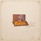 Arcadia Cigars Padrón 60th Anniversary Limited Edition cigar box with gold-wrapped cigars and a single cigar on lid.