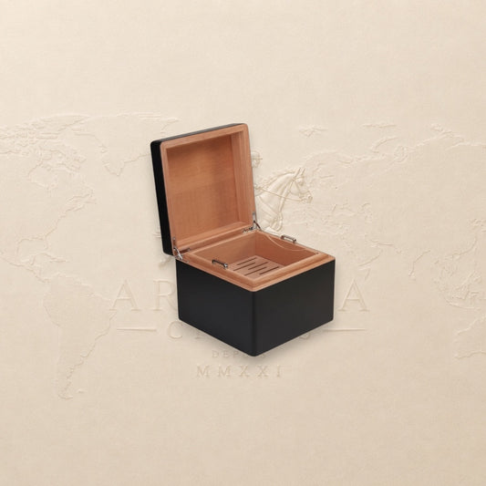 Arcadia Cigars S.T. Dupont black lacquered wood cigar humidor with palladium details, holds 50-75 cigars.