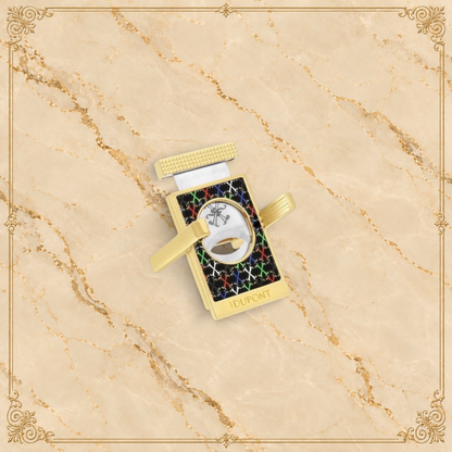Arcadia Cigars S.T. Dupont gold cigar cutter with black face, red, white, green, blue X pattern, and textured grip.