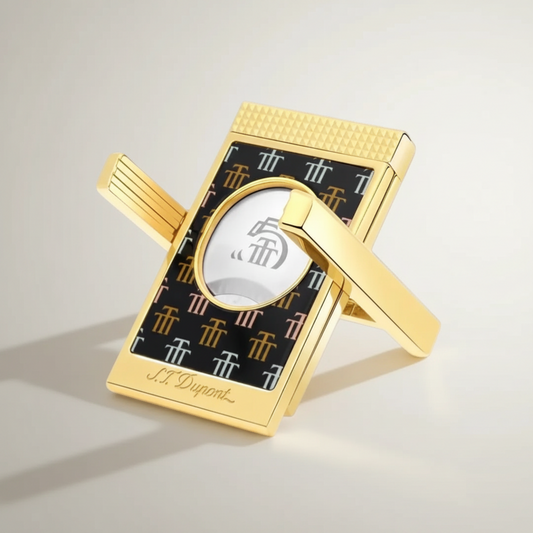 Arcadia Cigars S.T. Dupont Trinidad cigar cutter with gold finish and black lacquer body featuring the Trinidad "Golden T" motif.