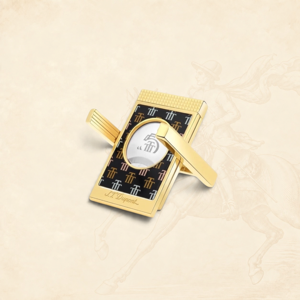 Arcadia Cigars S.T. Dupont Trinidad cigar cutter with gold finish and black lacquer body featuring the Trinidad "Golden T" motif.