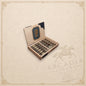 Arcadia Cigars box of Drew Estate Undercrown Maduro Flying Pig cigars with dark oily wrappers in a wooden display